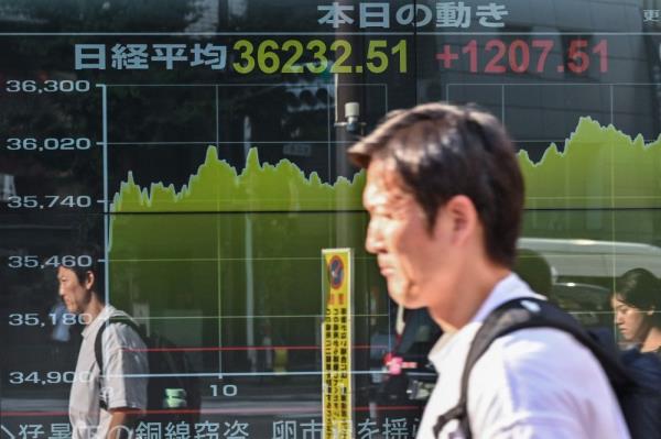 Japan’s Nikkei index soars over 3pc driven by positive US retail sales and yen drop